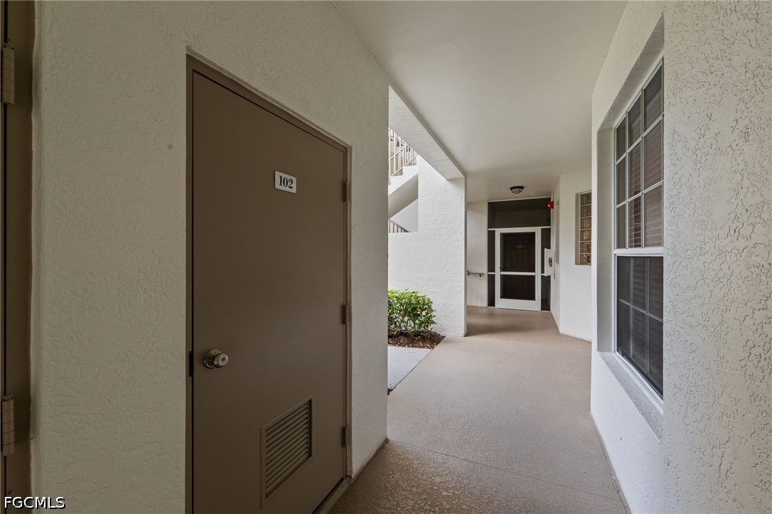 8239 Parkstone Unit 102, Naples, FL 34120
