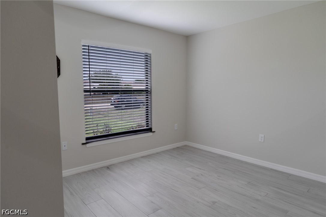 1028 Champion, Lehigh Acres, FL 33971