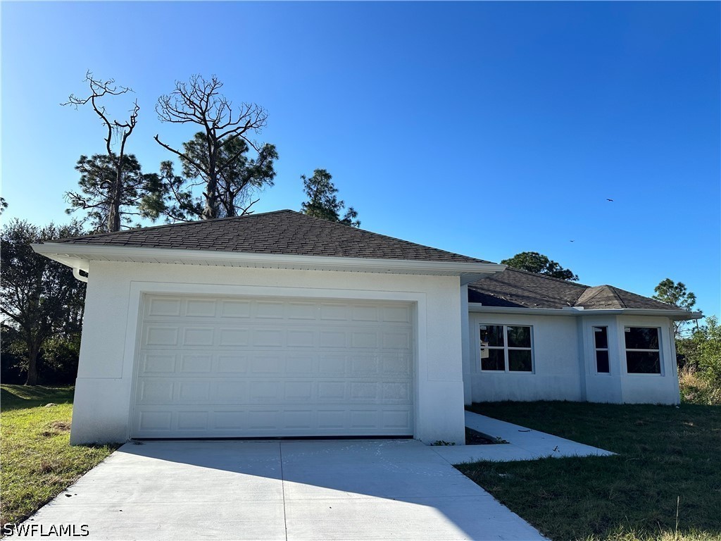 718 Chattman, Lehigh Acres, FL 33974