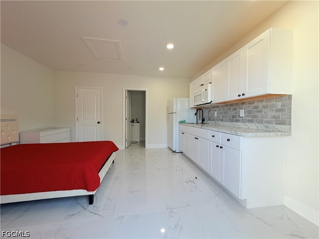 100 13th, Cape Coral, FL 33993
