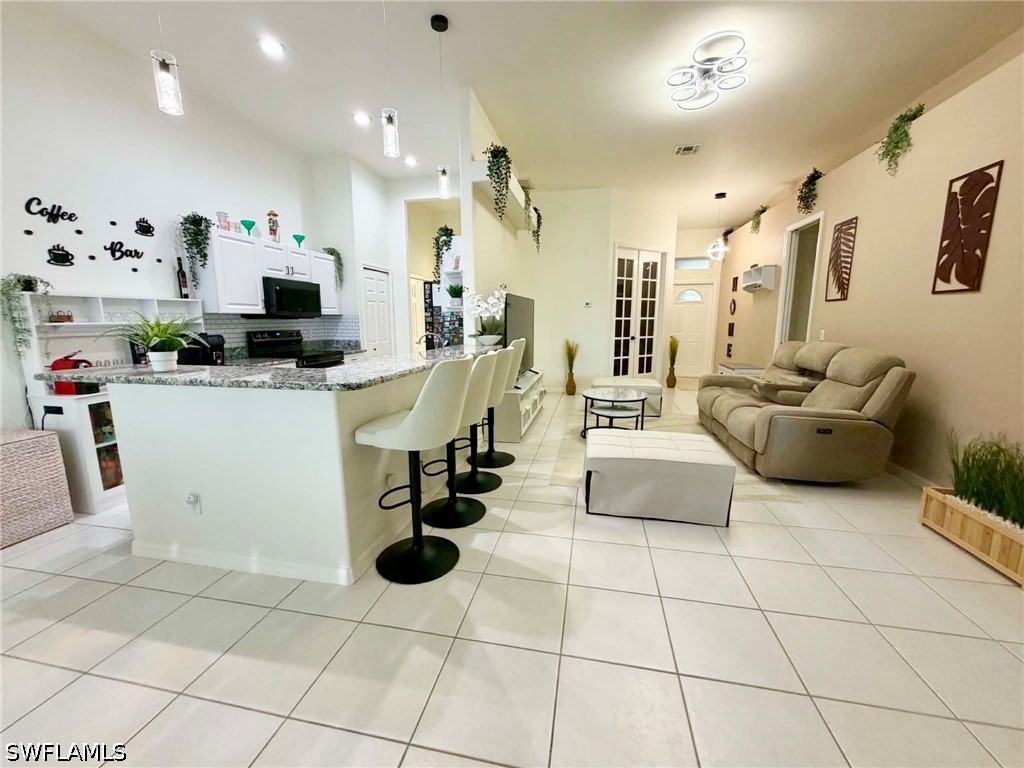 9052 Leatherwood, Lehigh Acres, FL 33936