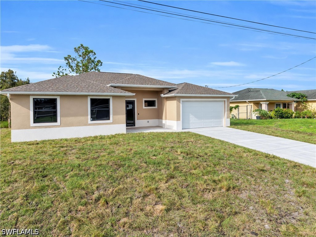 2704 37th, Lehigh Acres, FL 33976