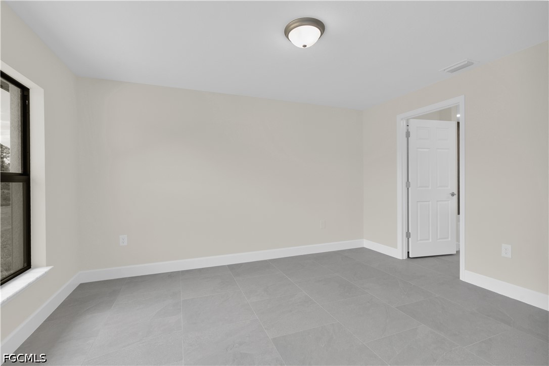 823 McKinley, Lehigh Acres, FL 33972