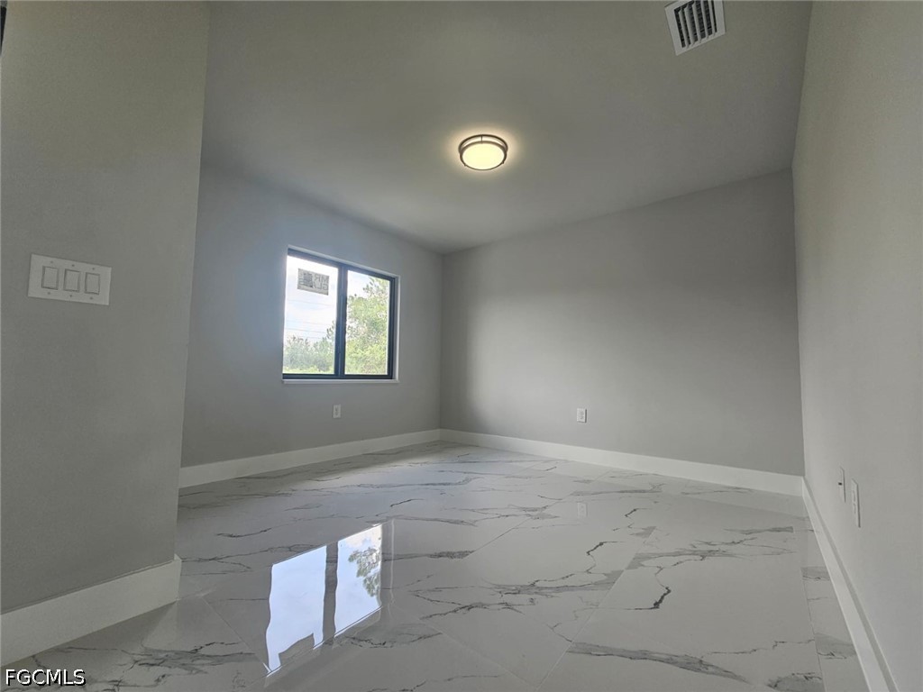 1102 Poinsettia, Lehigh Acres, FL 33972