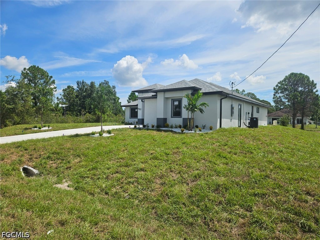 1102 Poinsettia, Lehigh Acres, FL 33972