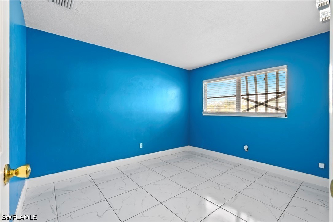 1681 Country Club, Lehigh Acres, FL 33936