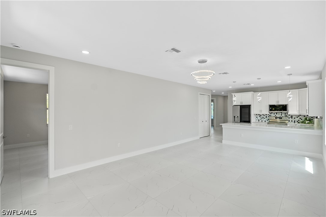 842 Naples, Lehigh Acres, FL 33974